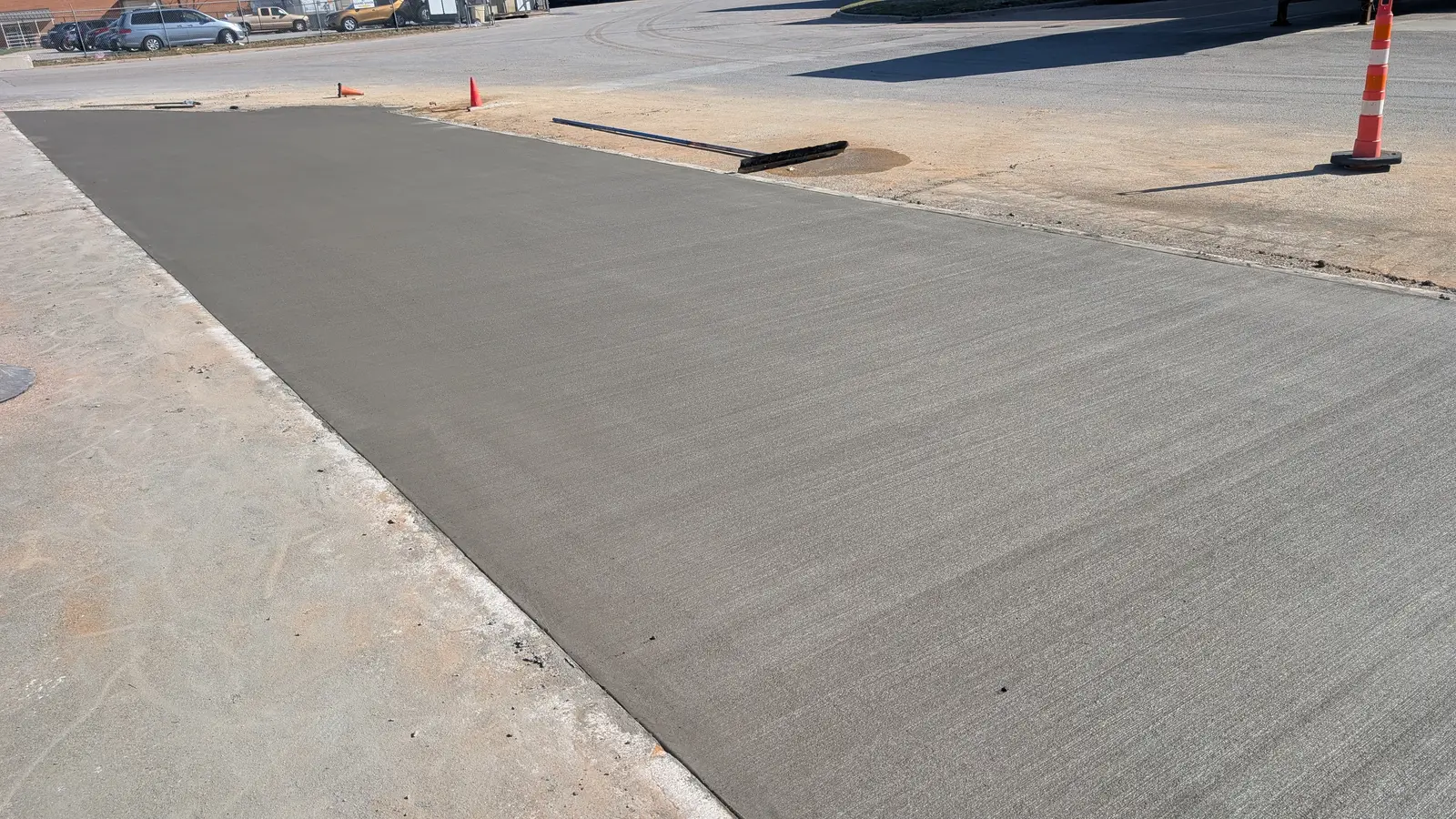 Freshly broom-finished concrete paving