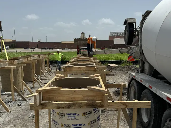 Sonotube pier forms staged ahead of a pour