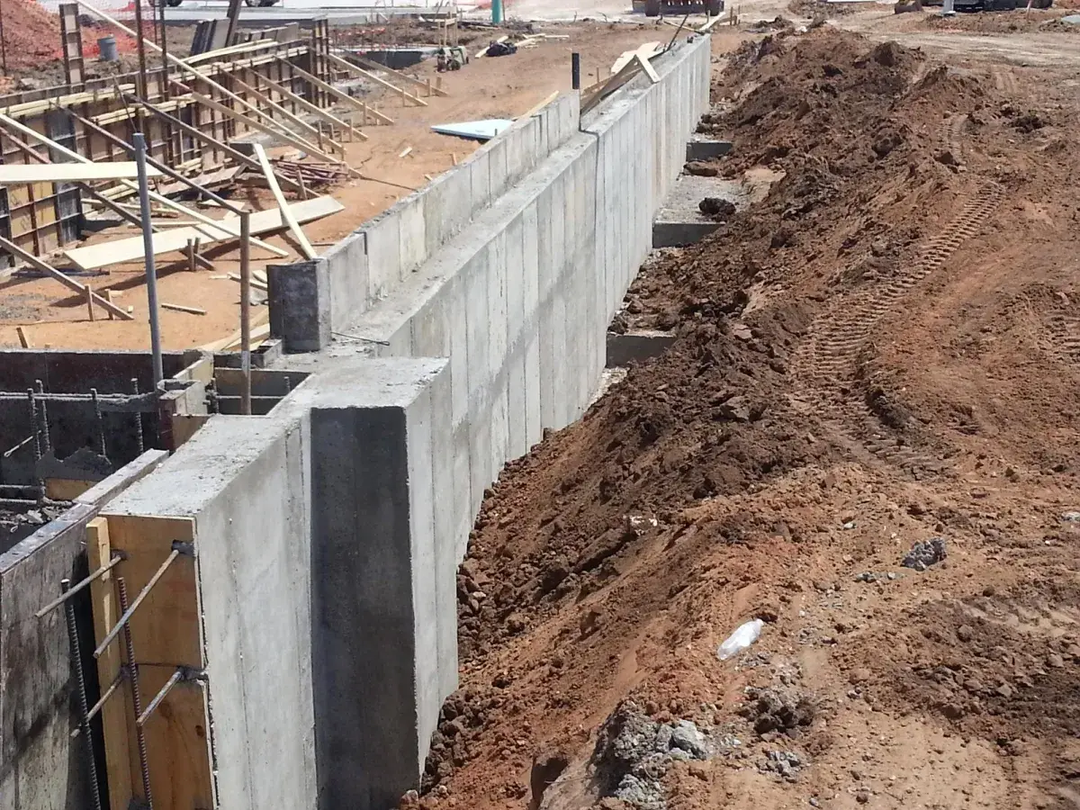Cast-in-place concrete retaining wall under construction