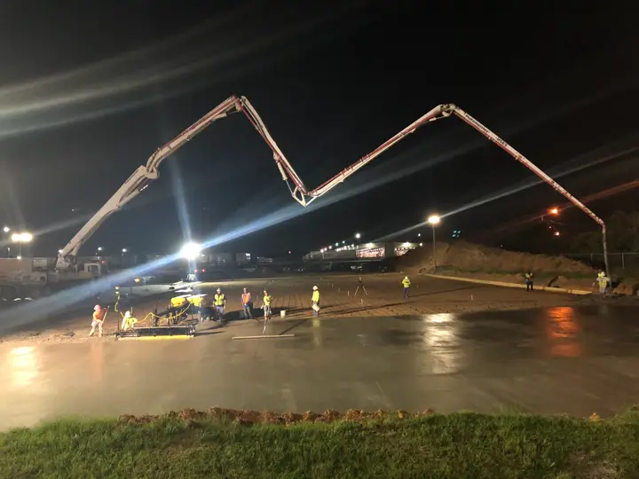 Boom pump, first light — Relentless Civil Construction jobsite