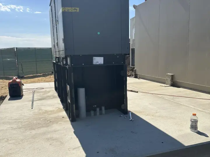 Equipment set on new concrete — Relentless Civil Construction jobsite