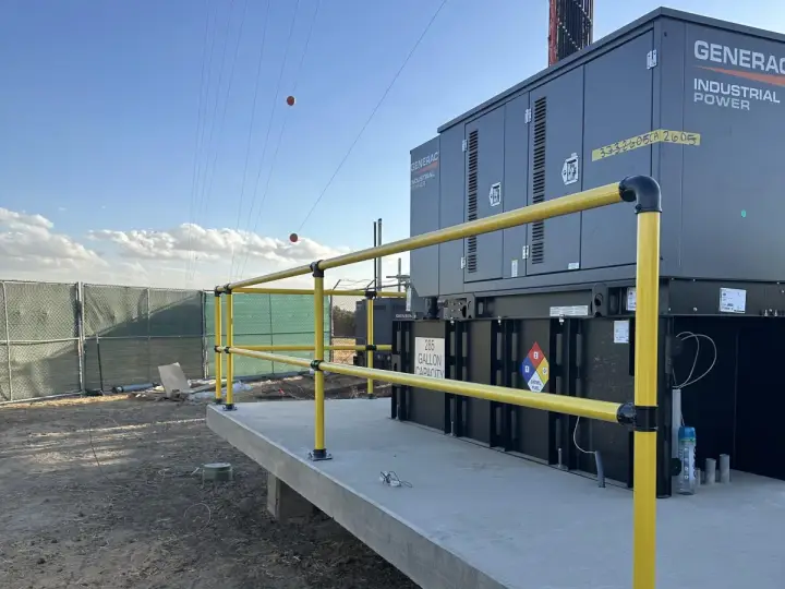 Guardrail pad — equipment row — Relentless Civil Construction jobsite