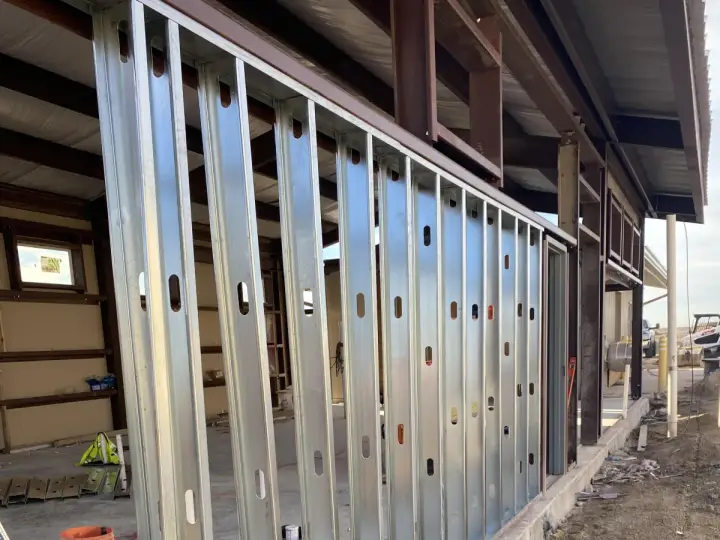 Slab edge, studs up — Relentless Civil Construction jobsite